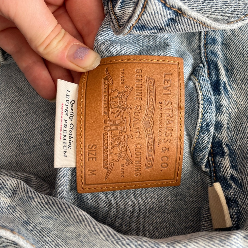 levi’s jean jacket with some paint details, medium